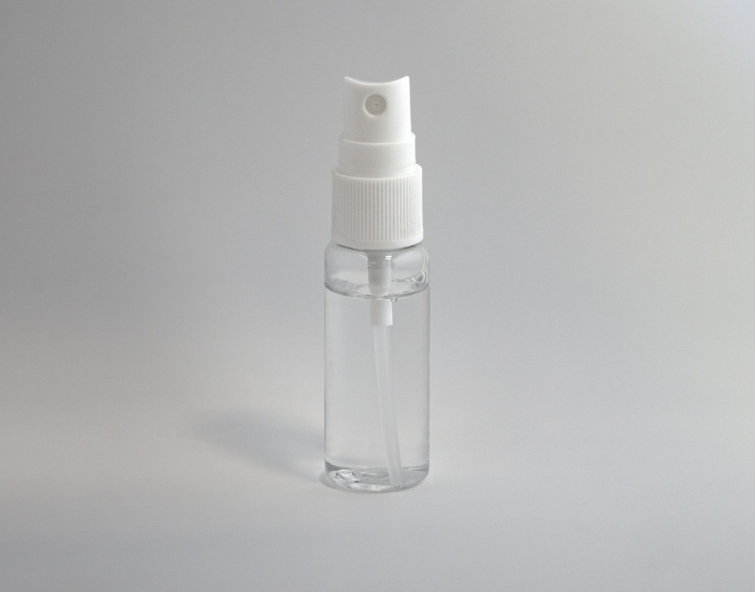 clear and white spray bottle